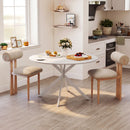 Tavolo da Pranzo Rotondo Stile Industriale Ø120x75 cm con Piano in Truciolare e Gambe a Croce in Acciaio Bianco      