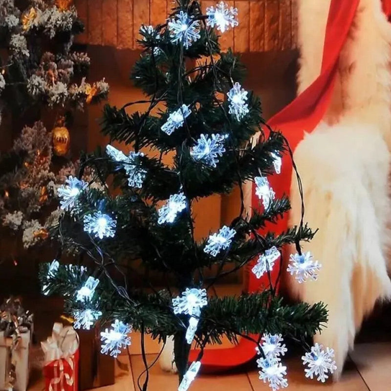 Luci di Natale 50 MicroLed a forma di Fiocco di Neve Bianco Freddo a batteria da Interno