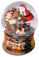 Palla di Vetro Natalizia Ø15 cm con Neve e Musica Bambino e Babbo Natale