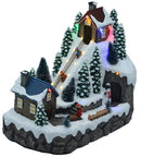 Villaggio Natalizio in Resina Pista da Sci con Luci e Suoni 28x16xh25 cm