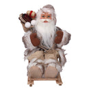 Babbo natale in tessuto su slitta marrone 30h cm
