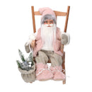 Babbo natale in tessuto su sedia rosa cm xh30