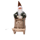 Pupazzo Babbo Natale in Tessuto con slitta verde cm 33x12xh30