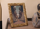 Cornice Poppy 19,8x2x25 cm in Resina e Vetro Oro      