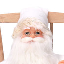 Babbo natale in tessuto su sedia bianco e oro cm xh30